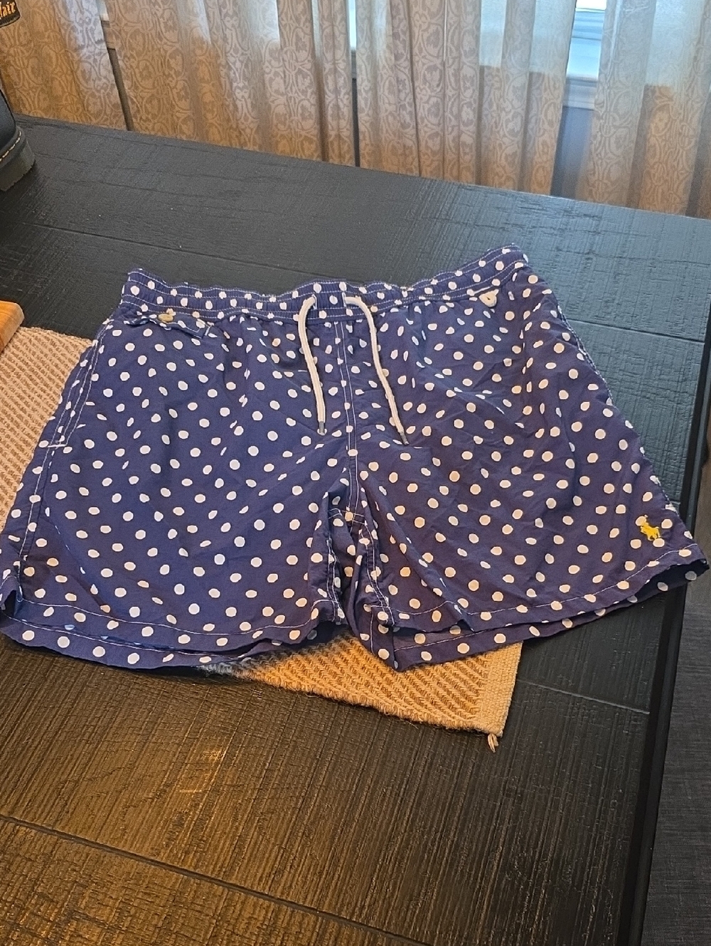 Polo Ralph Lauren polka dot swim trunks in freshwater blue.